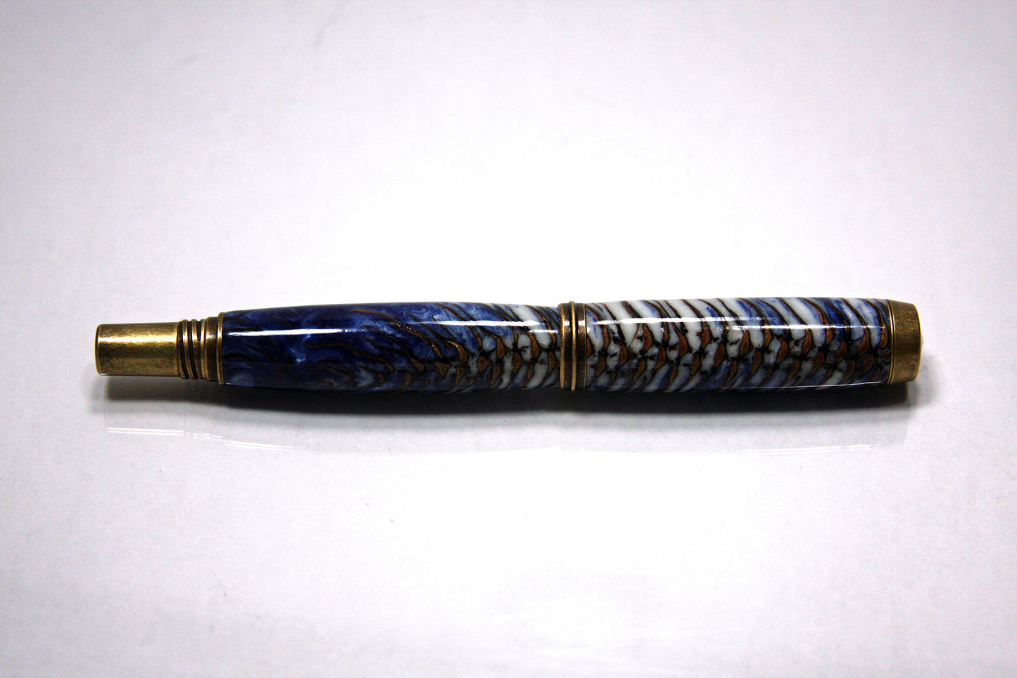 Rollerball Pen with Antique Brass Finish | Pinecone-Embedded Blue Resin