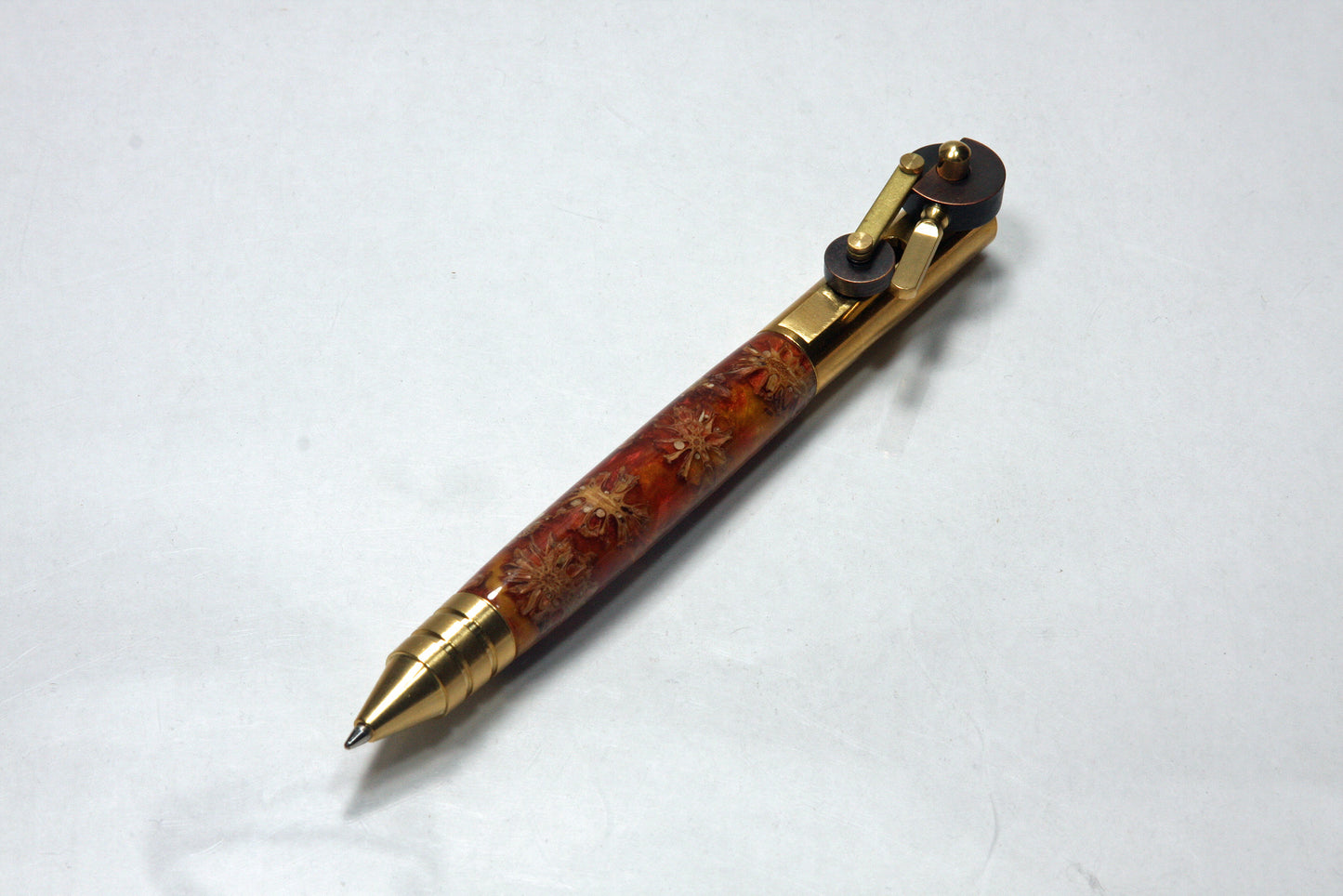 Steampunk Inspired Piston Ballpoint Pen with Dual Finish Gears and Pinecone Resin Body